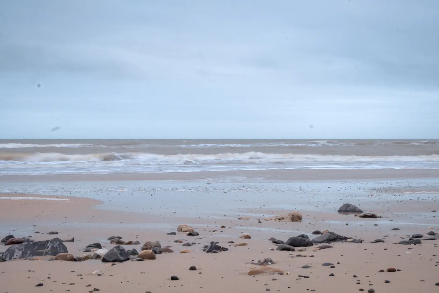 Rocks and sand on the beach at low tide