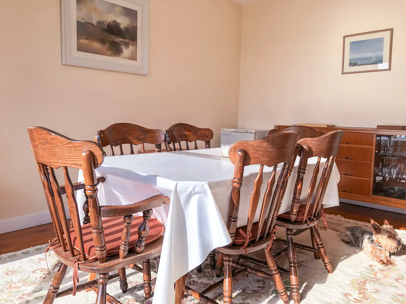 Dining room with wooden table and chairs
