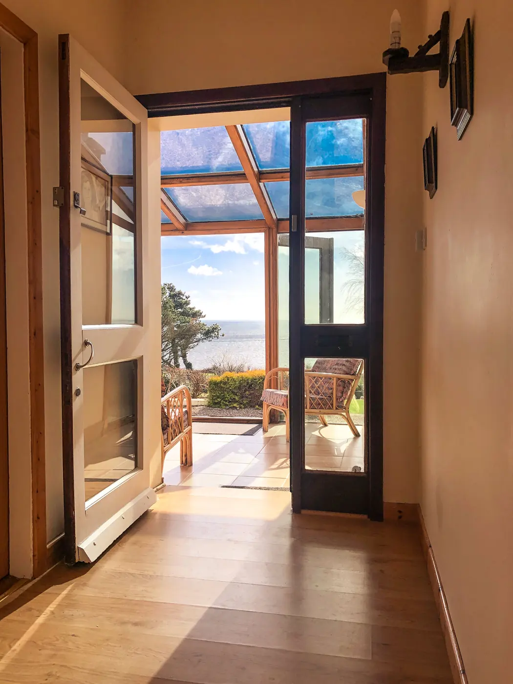Looking down the hall through the conservatory to the sea