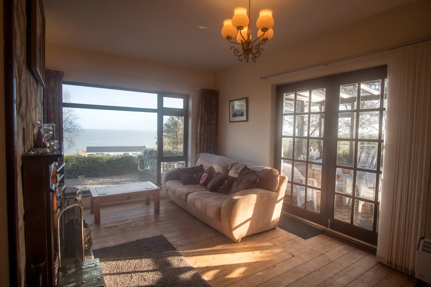 Living room with sofa and French doors
