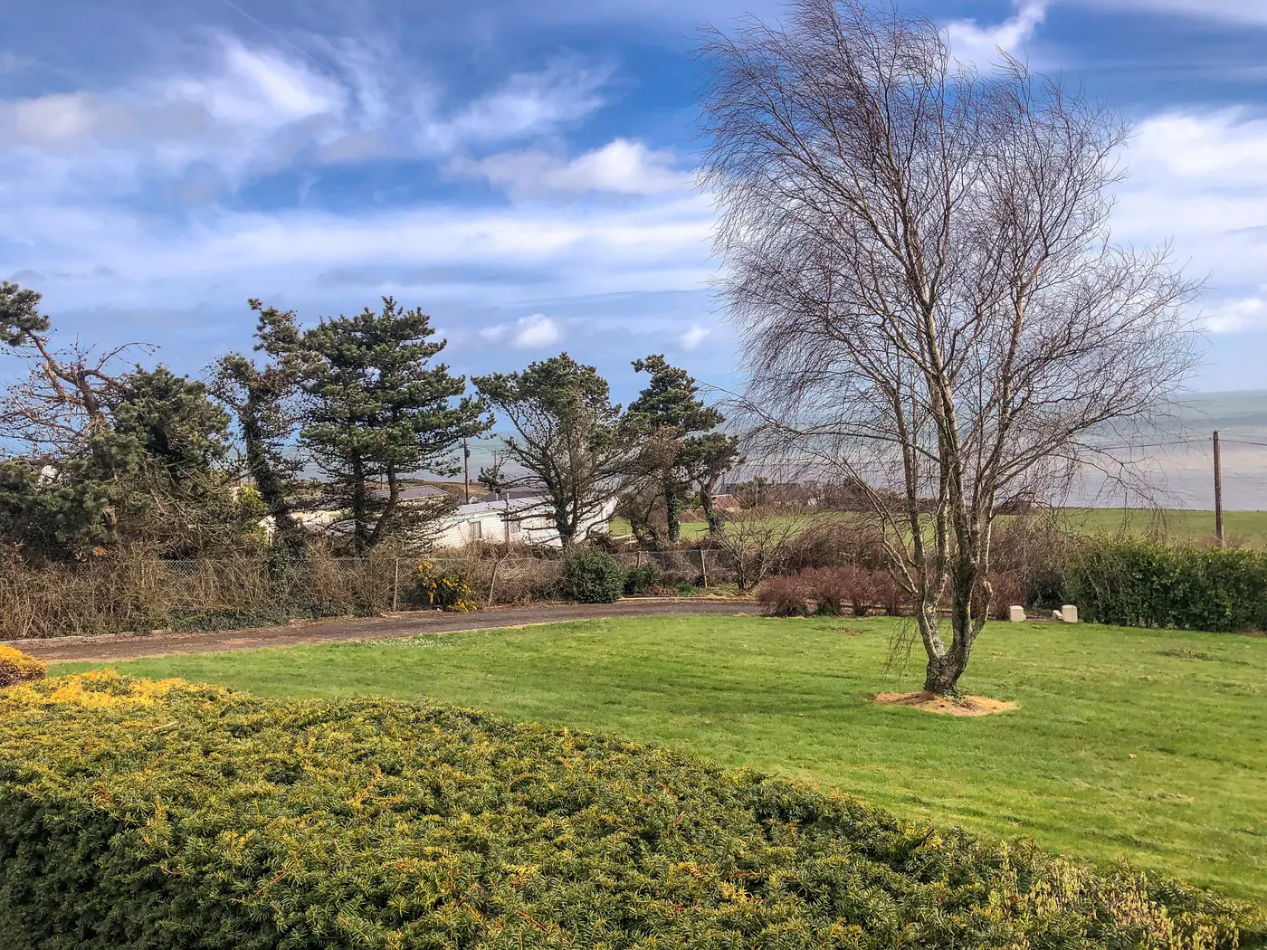 The front garden with the sea beyond